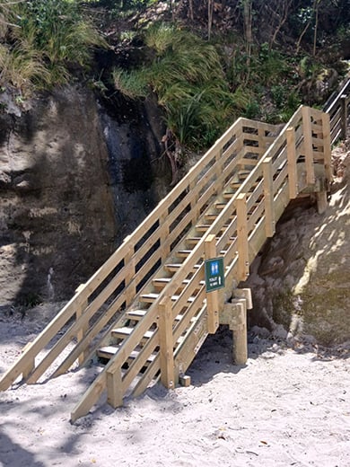 New stairs leading to the beach area.