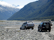 4WD drive vehicles in river bed. Photo: Ursula Paul. 