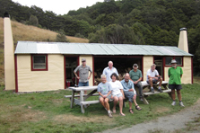 Flora Hut after makeover with Nelson Tramping Club members. Photo: Ian Morris.  
