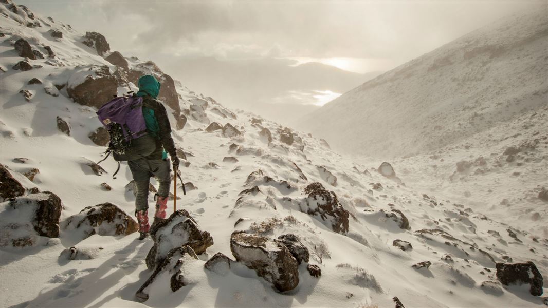 Well-equipped winter hiker on Tongariro Alpine Crossing.