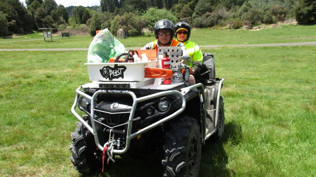 People on quad bike. 