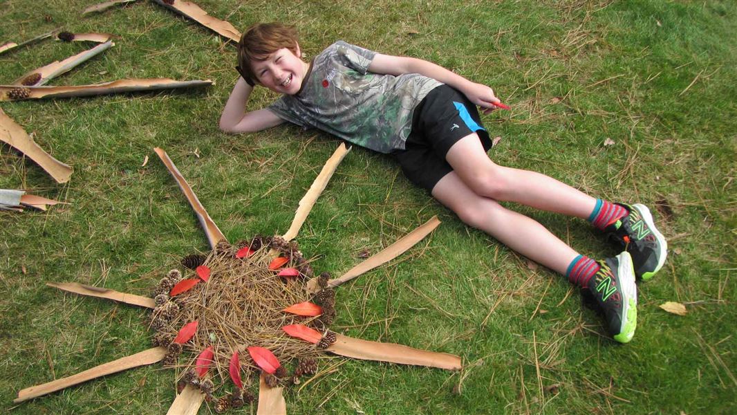 Child with leaf creation. 