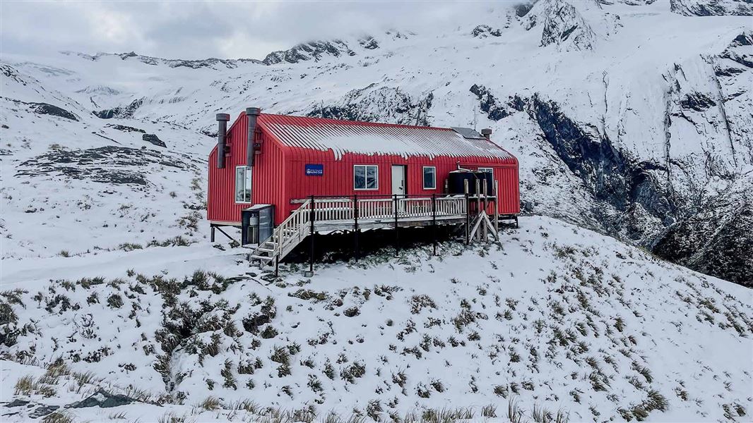 French Ridge Hut winter time surrounded by snow. 