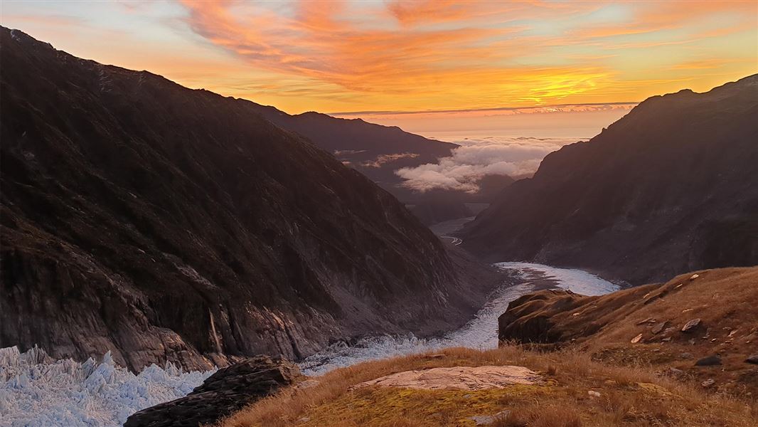 Sunset over Fox Glacier and Chancelor Hut