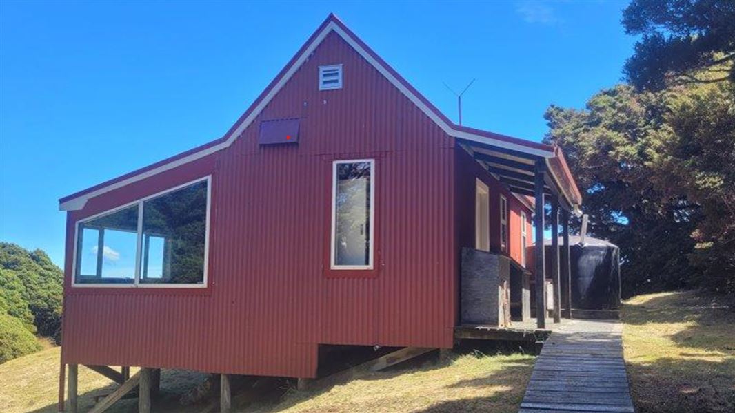 Image of brown Kirwan's Hut.