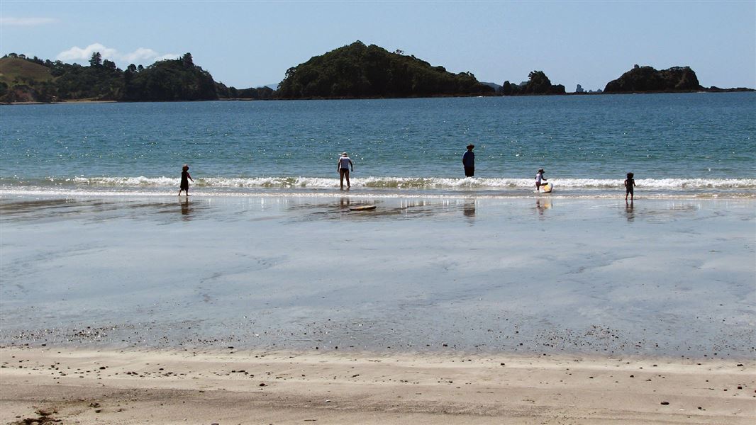 Playing on beach.