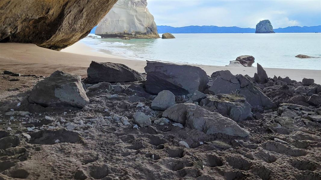 Recent rockfall under famous archway at Cathedral Cove.