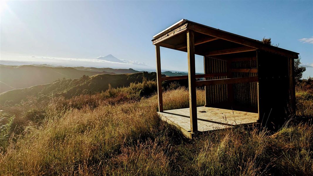 Landscape image with Mt Taranaki in the distance.