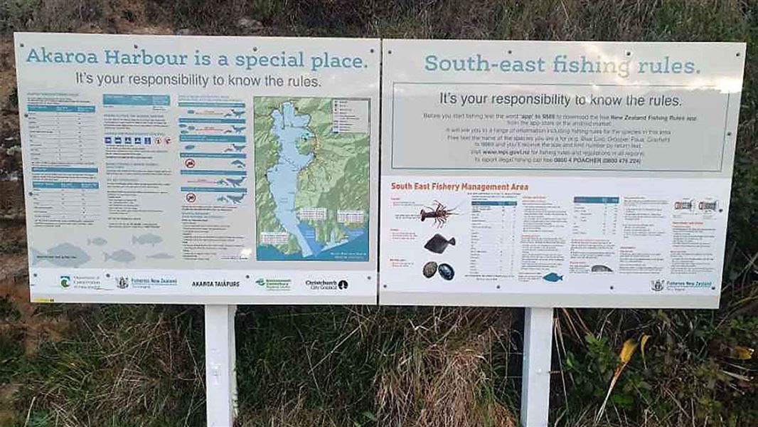 A sign with various rules for the Akaroa Marine Reserve