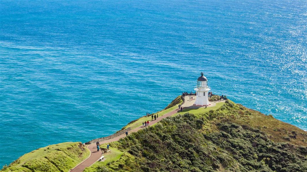 Cape Reinga/Te Rerenga Wairua Lighthouse overlooking the Tasman Sea. 