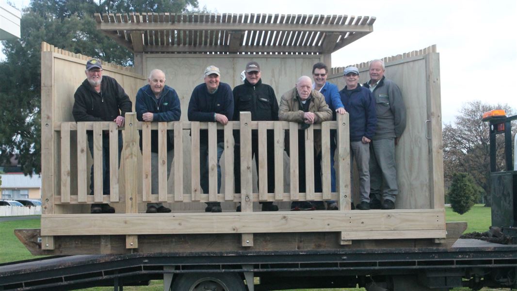 Napier Menzshed volunteers with DOC Ranger and Aramoana Trust General Manager standing in new bird hide. 