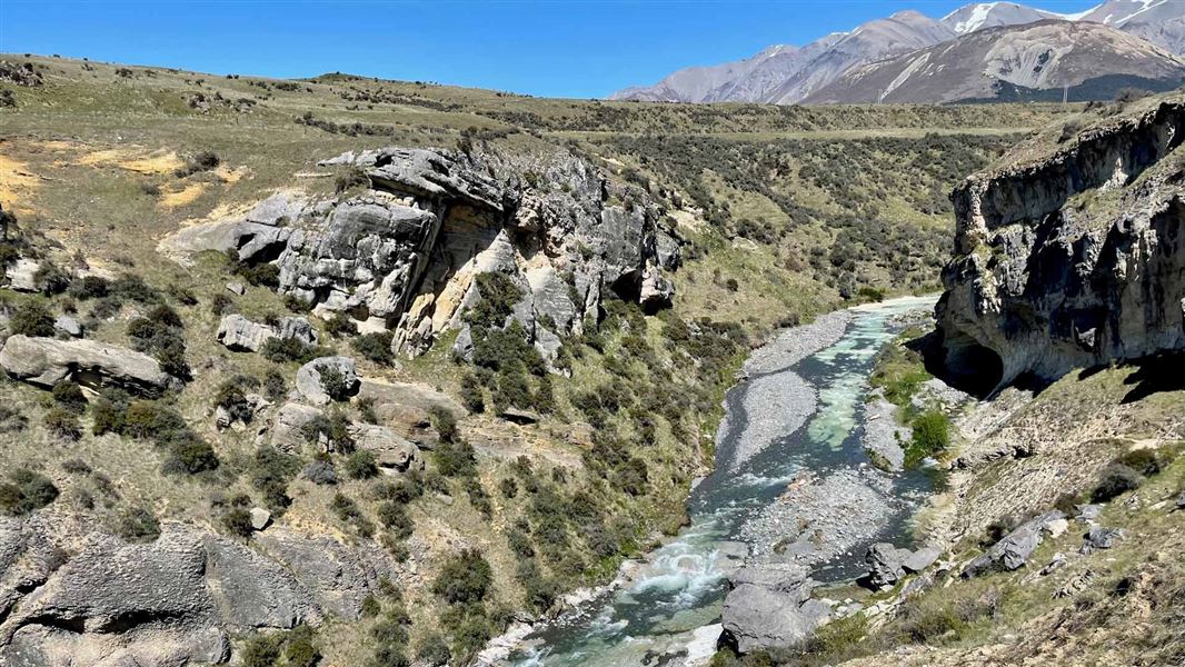 View from the terrace overlooking Broken River and the cave’s outflow entrance.