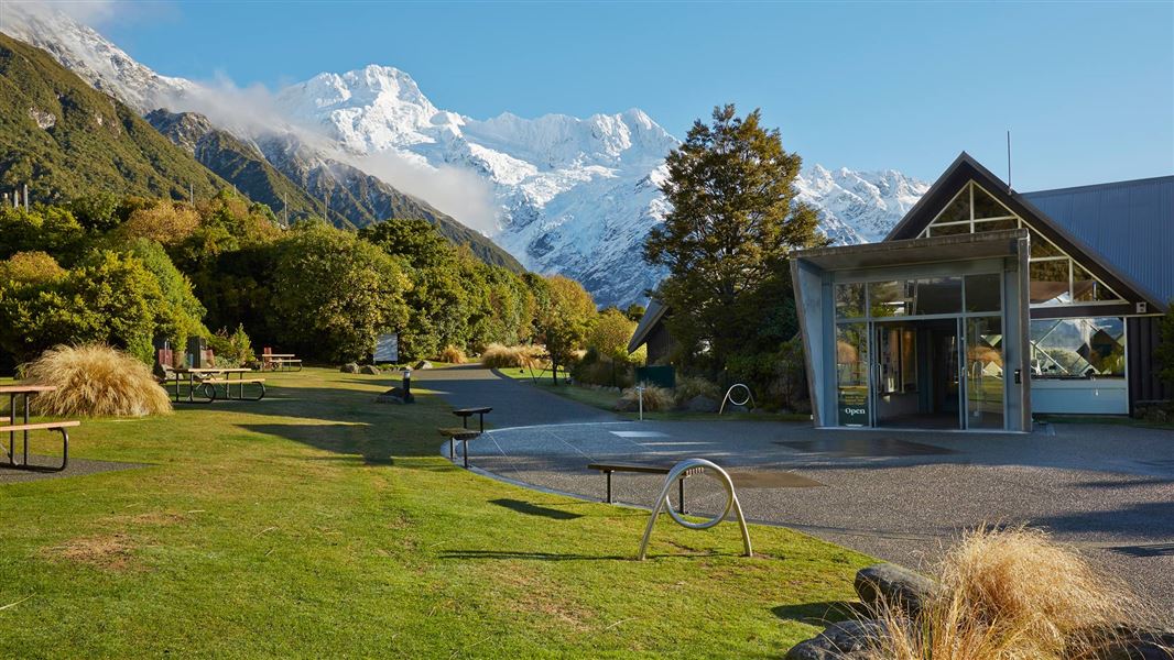 Visitor centre with mountain in background. 