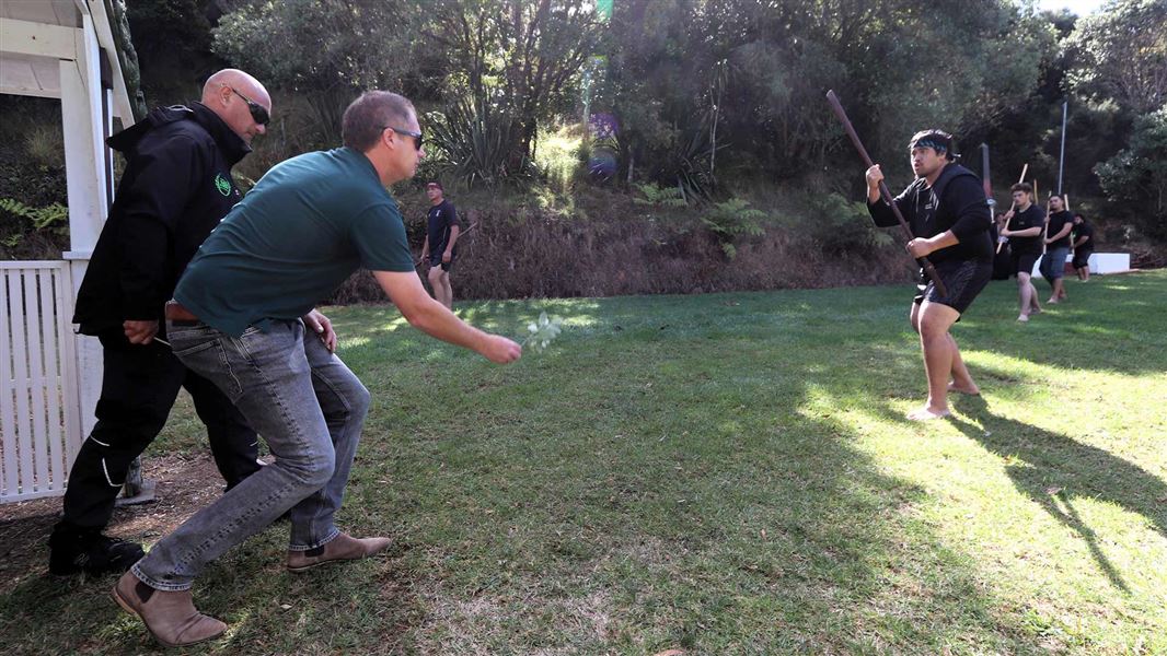 Northland Regional Council Chief Executive Jonathan Gibbard accepts a wero (challenge) during a powhiri at Rawhiti today to launch a decade-long plan to remove all deer from Northland. 