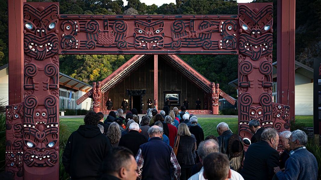 People walking to a marae