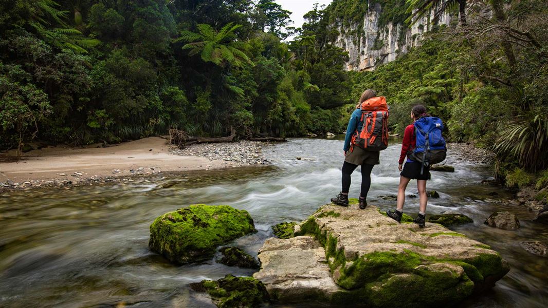 Trampers at Pororari River. 