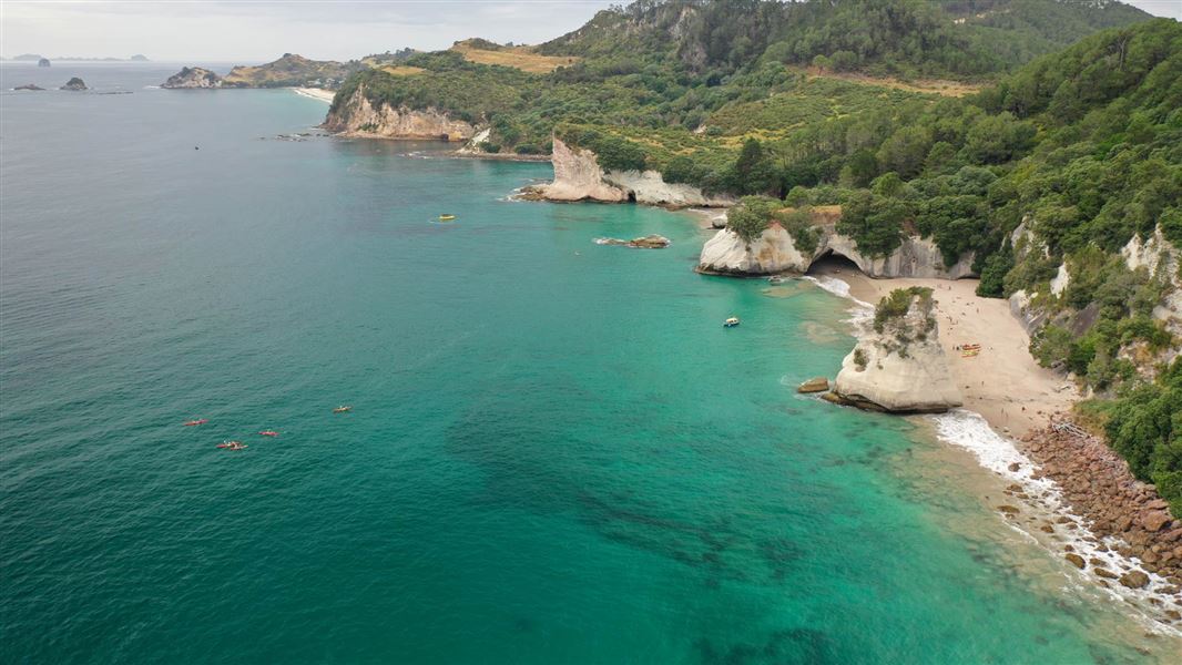 Drone image of the marine reserve showing the ocean and the shore.