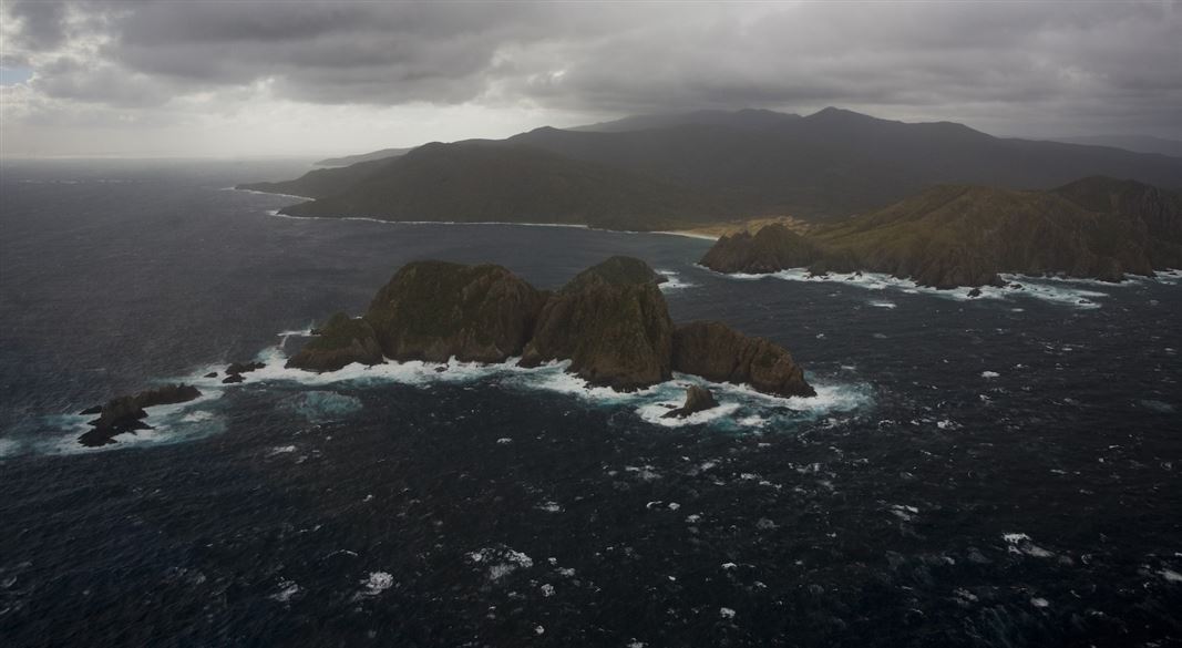 Photo of Whenua Hou/Codfish Island on a stormy day