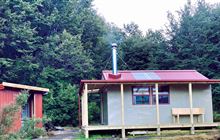 DOC reveals “dream-makeover” of rat-infested hut